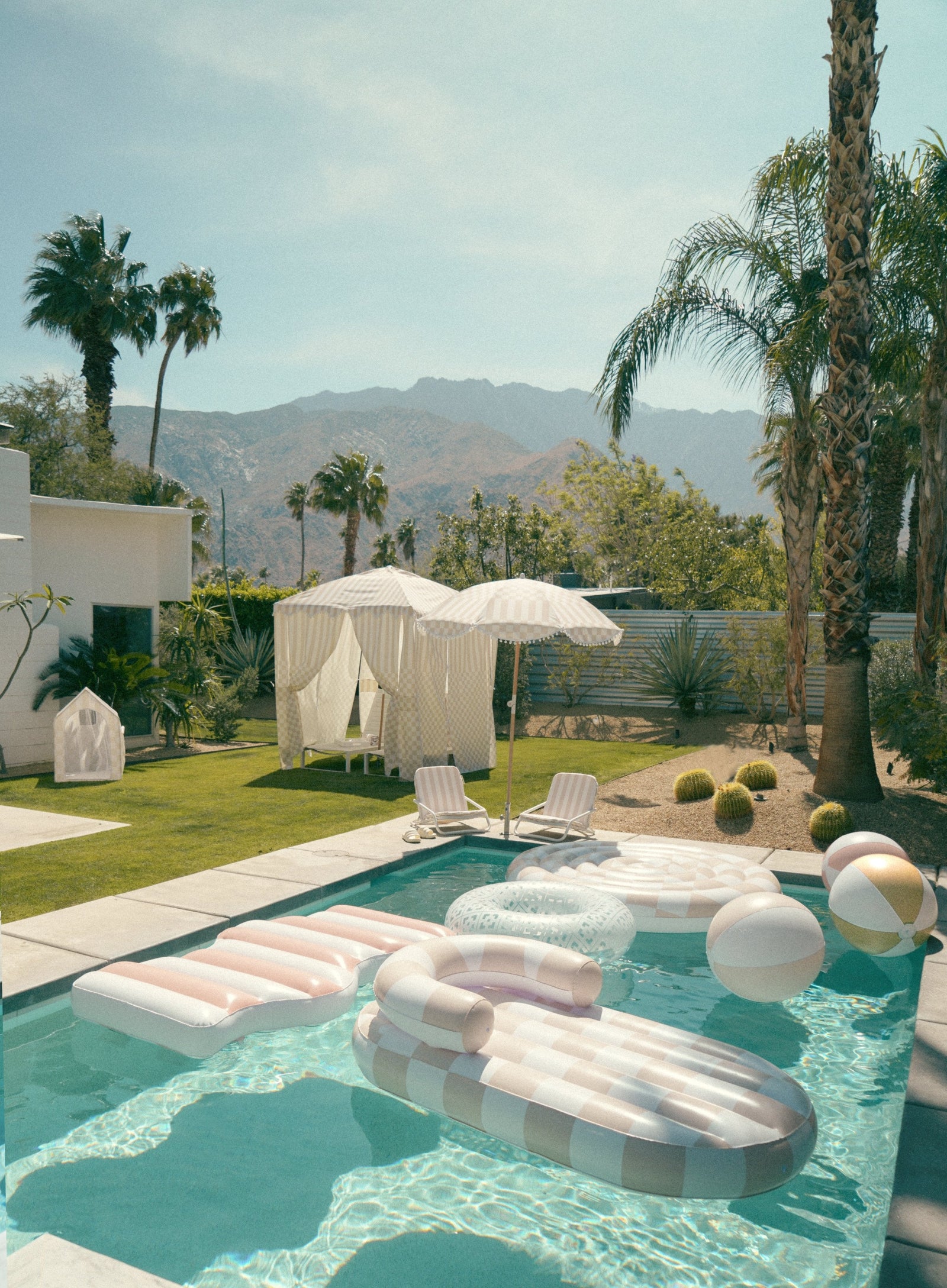 the CHECKER CABANA STRIPE Beach Cabana in Sand