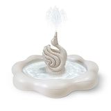 the COASTAL TRAVERTINE Swan Fountain Sprinkler