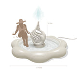the COASTAL TRAVERTINE Swan Fountain Sprinkler